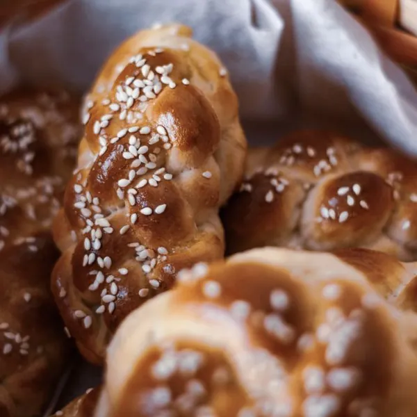 Sesame bread plait in a wicker basket